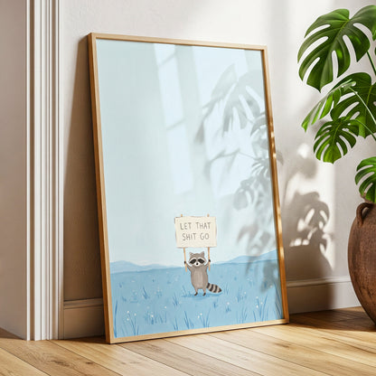 Let It Go Raccoon, blue, beige, gray nature wall art displayed in a styled interior, gallery view 9