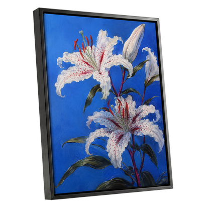 Lilies in Cobalt, blue, white, green floral wall art shown as a black framed canvas wall art
