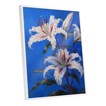 Lilies in Cobalt, blue, white, green floral wall art shown as a white framed poster wall art print