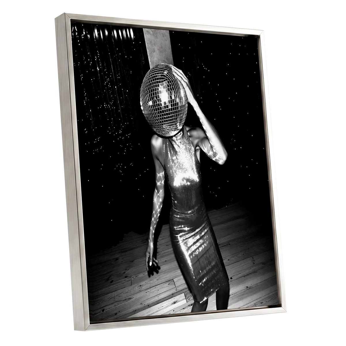 Midnight Mirrorball, black, white, gray minimalist wall art shown as a silver framed canvas wall art