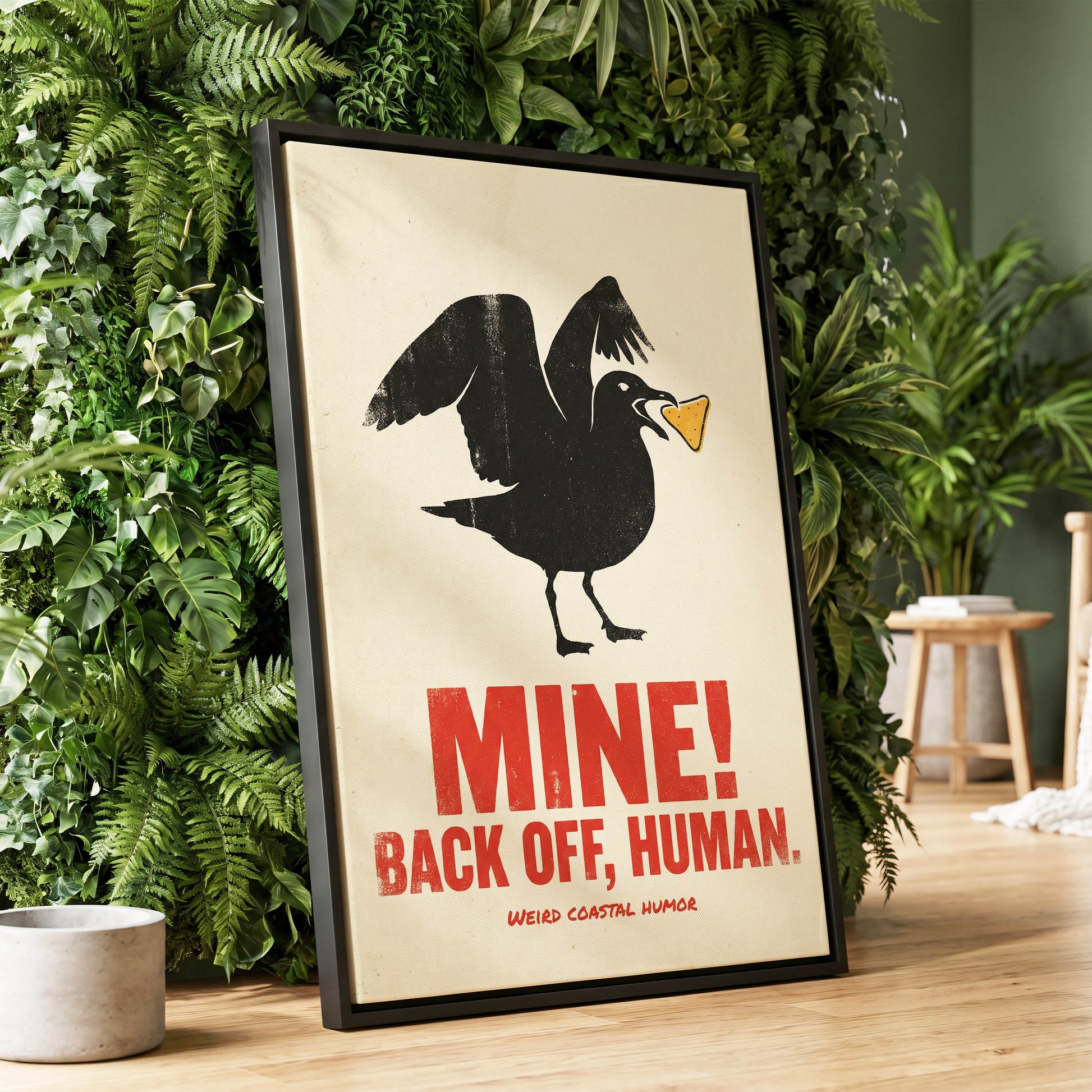 Mine! Coastal Gull, black, beige, red nature wall art displayed in a styled interior, gallery view 1