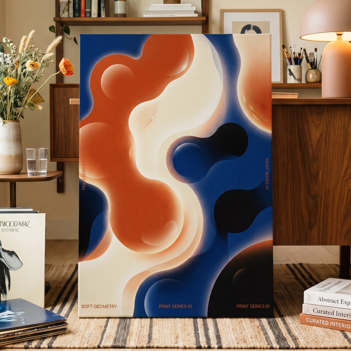 Molten Orbit, blue, orange, beige abstract wall art on canvas displayed in a styled interior, gallery view 1