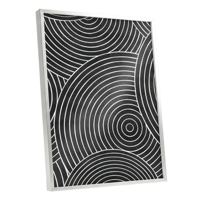 Monochrome Orbit, black, white, gray abstract wall art shown as a silver framed poster wall art print