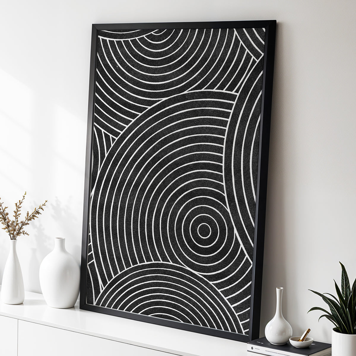 Monochrome Orbit, black, white, gray abstract wall art displayed in a styled interior, gallery view 2