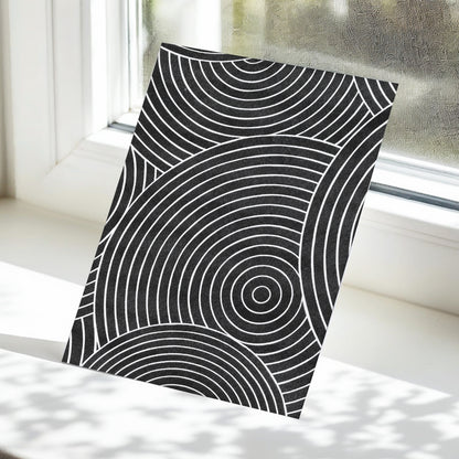 Monochrome Orbit, black, white, gray abstract wall art displayed in a styled interior, gallery view 5