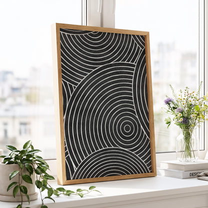 Monochrome Orbit, black, white, gray abstract wall art displayed in a styled interior, gallery view 6