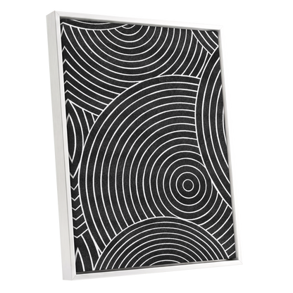 Monochrome Orbit, black, white, gray abstract wall art shown as a white framed canvas wall art