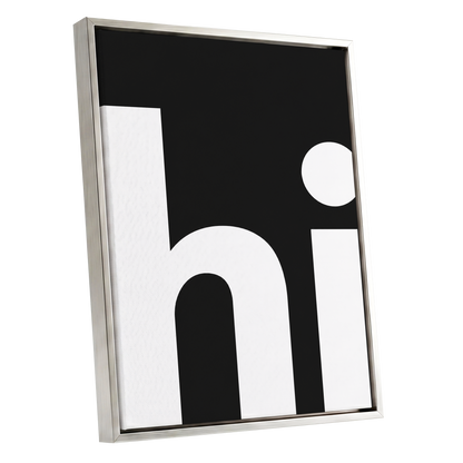 Monumental Letterform, black, white minimalist wall art shown as a silver framed canvas wall art
