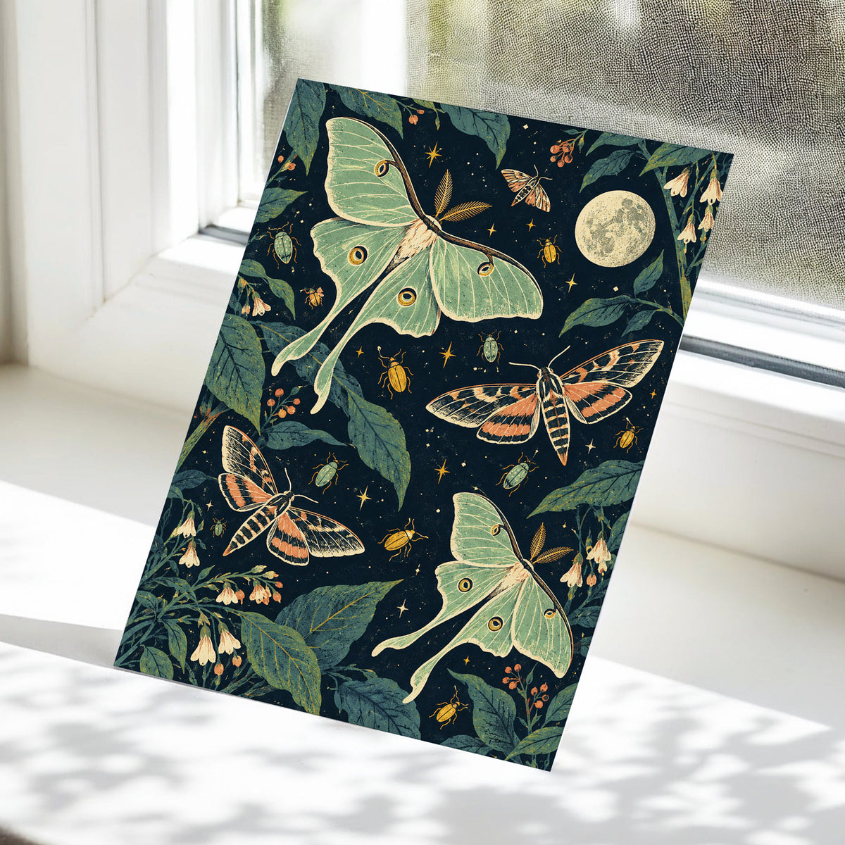 Moonlit Moth Garden, black, green, beige nature wall art displayed in a styled interior, gallery view 5