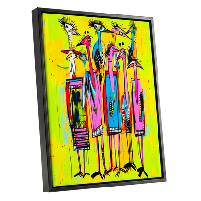 Neon Wading Birds, yellow, pink, blue nature wall art shown as a black framed canvas wall art