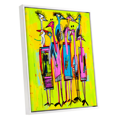 Neon Wading Birds, yellow, pink, blue nature wall art shown as a white framed canvas wall art