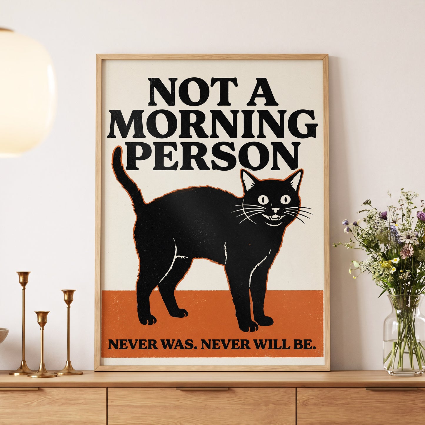 Never a Morning Person, black, beige, orange nature wall art displayed in a styled interior, gallery view 5