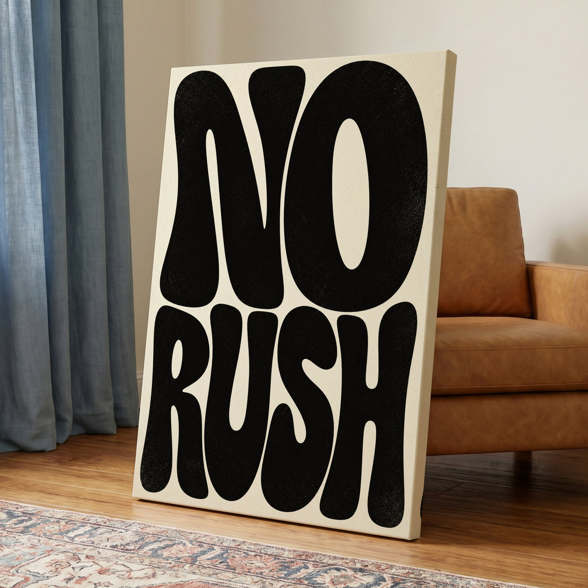 No Rush, Boldly, black, beige minimalist wall art on canvas displayed in a styled interior, gallery view 1