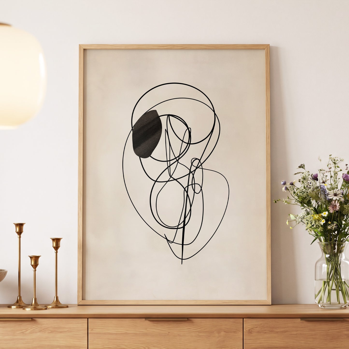 Orbiting Lines, black, beige abstract wall art displayed in a styled interior, gallery view 5