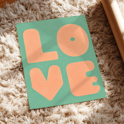 Peach Love Letters, green, orange, pink minimalist wall art displayed in a styled interior, gallery view 5