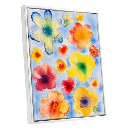 Petal Confetti, blue, yellow, orange floral wall art shown as a white framed canvas wall art