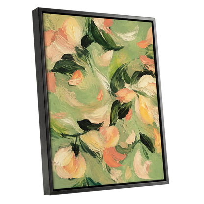 Petals in Sage, green, orange, pink floral wall art shown as a black framed canvas wall art