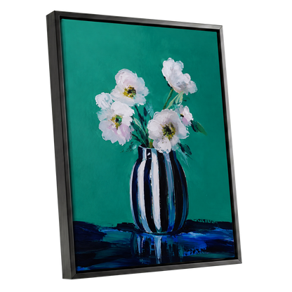 Petals in Teal, green, white, black floral wall art shown as a black framed canvas wall art
