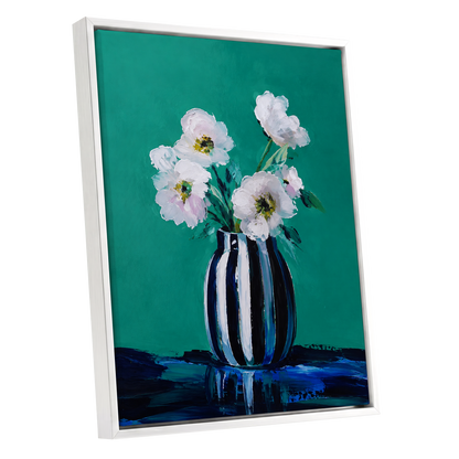 Petals in Teal, green, white, black floral wall art shown as a white framed canvas wall art