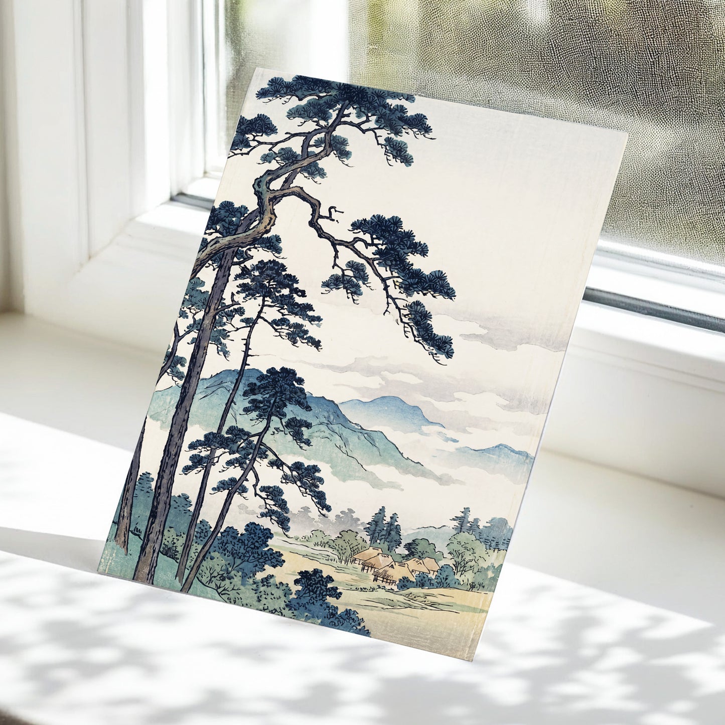 Pines Above the Mist, black, blue, beige nature wall art displayed in a styled interior, gallery view 5