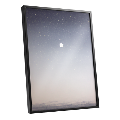Quiet Orbit, gray, white, gold nature wall art shown as a black framed poster wall art print