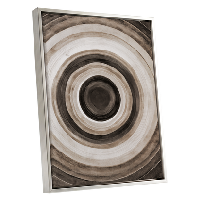 Quiet Orbit, black, brown, beige abstract wall art shown as a silver framed canvas wall art