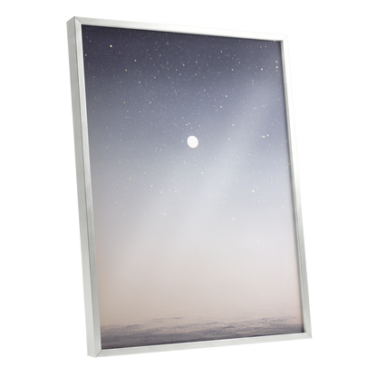 Quiet Orbit, gray, white, gold nature wall art shown as a silver framed poster wall art print