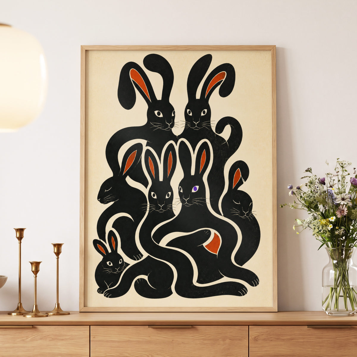 Rabbit Rhapsody, black, beige, orange nature wall art displayed in a styled interior, gallery view 6