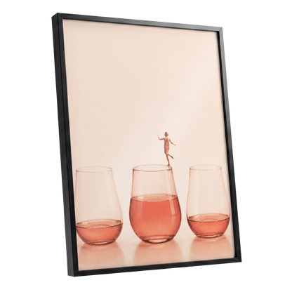 Rosé on the Rim, beige, pink, orange minimalist wall art shown as a black framed poster wall art print