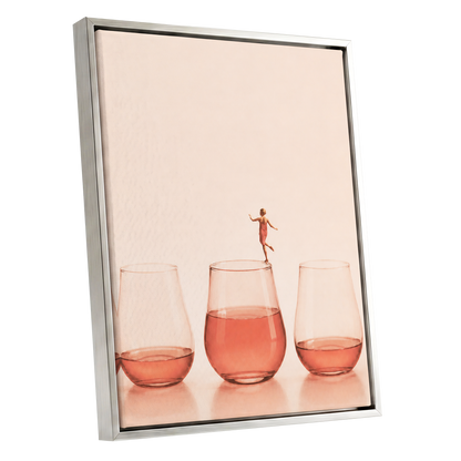 Rosé on the Rim, beige, pink, orange minimalist wall art shown as a silver framed canvas wall art