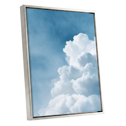 Skyward Billows, blue, white, gray nature wall art shown as a silver framed canvas wall art