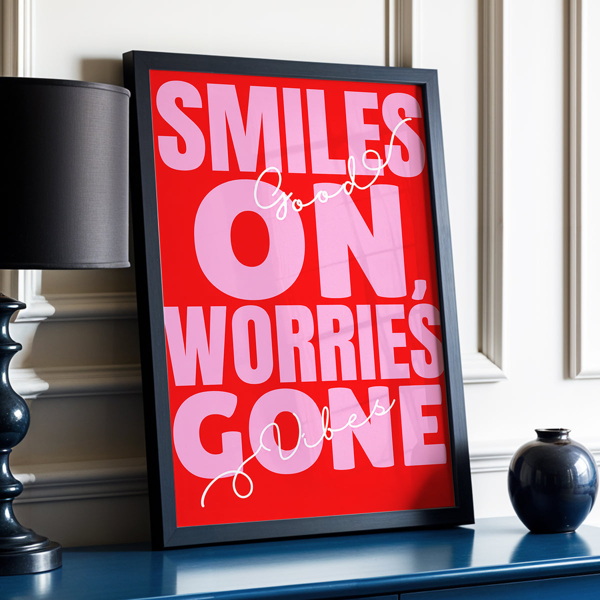 Smiles On, Worries Gone, red, pink, white minimalist wall art displayed in a styled interior, gallery view 3