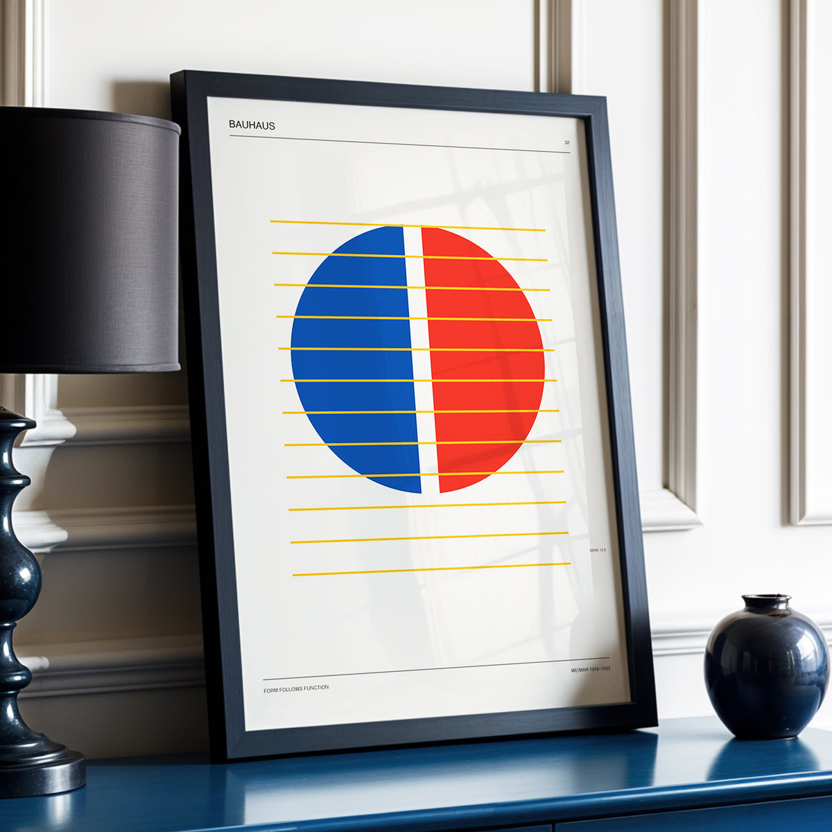 Split Circle Rhythm, beige, blue, red minimalist wall art displayed in a styled interior, gallery view 2
