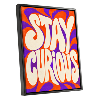 Stay Curious Swirl, orange, purple, beige abstract wall art shown as a black framed canvas wall art
