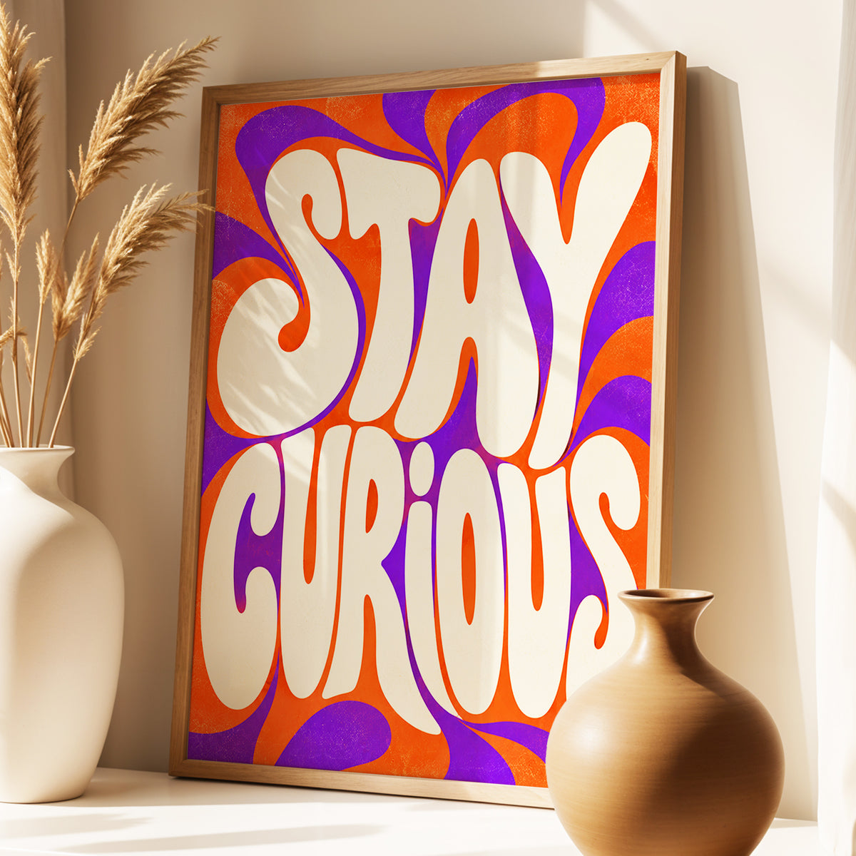 Stay Curious Swirl, orange, purple, beige abstract wall art displayed in a styled interior, gallery view 3