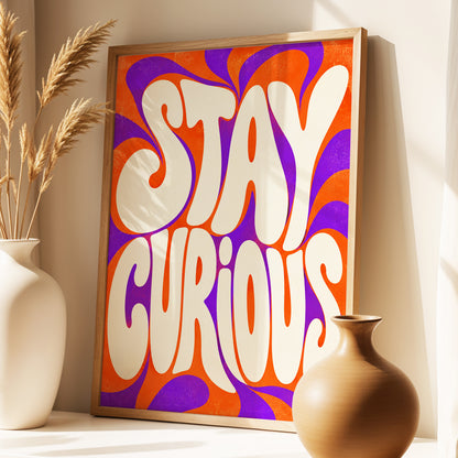 Stay Curious Swirl, orange, purple, beige abstract wall art displayed in a styled interior, gallery view 3
