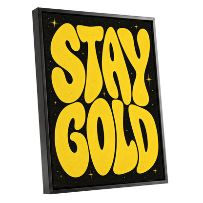 Stay Gold Starburst, yellow, black abstract wall art shown as a black framed canvas wall art