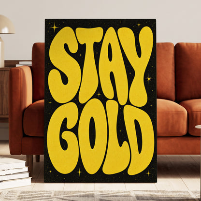 Stay Gold Starburst, yellow, black abstract wall art on canvas displayed in a styled interior, gallery view 1