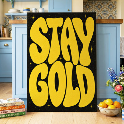 Stay Gold Starburst, yellow, black abstract wall art on canvas displayed in a styled interior, gallery view 2