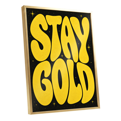 Stay Gold Starburst, yellow, black abstract wall art shown as a gold framed poster wall art print