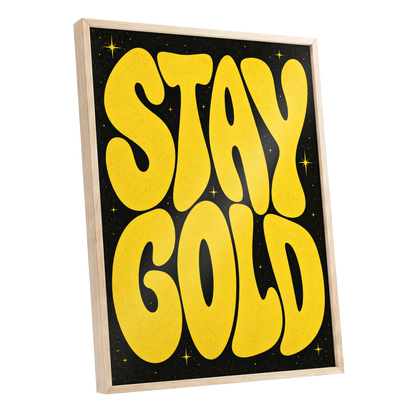 Stay Gold Starburst, yellow, black abstract wall art shown as a oak framed poster wall art print
