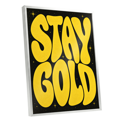 Stay Gold Starburst, yellow, black abstract wall art shown as a silver framed poster wall art print