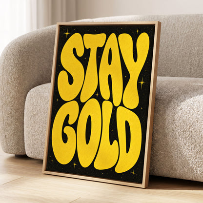Stay Gold Starburst, yellow, black abstract wall art displayed in a styled interior, gallery view 1