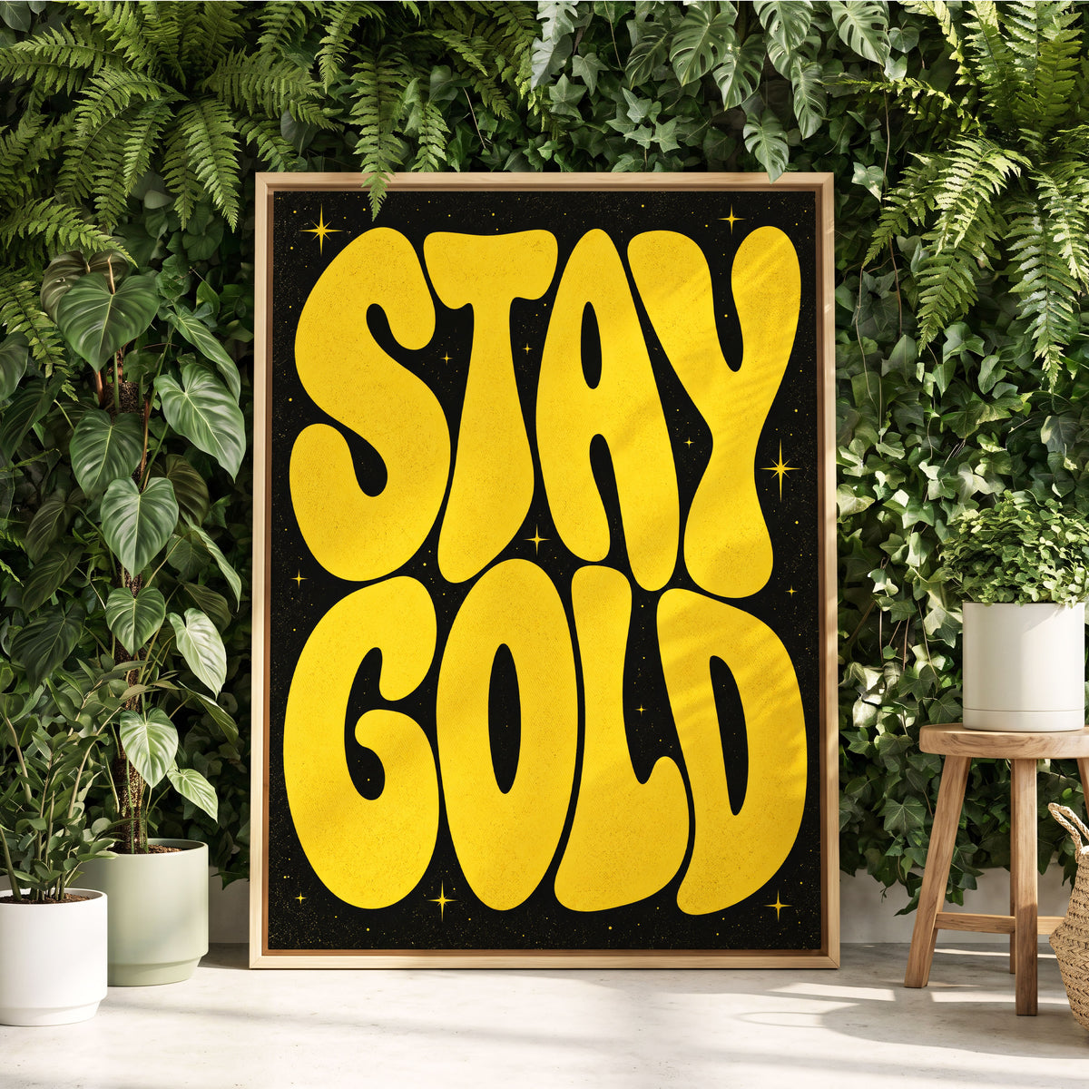 Stay Gold Starburst, yellow, black abstract wall art displayed in a styled interior, gallery view 2