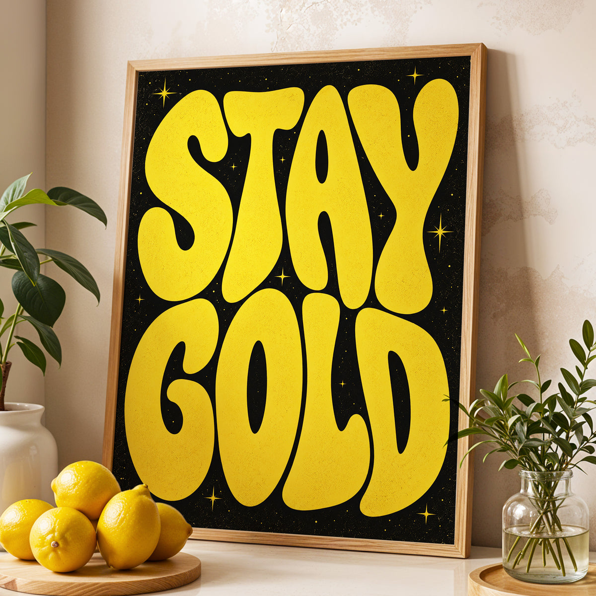 Stay Gold Starburst, yellow, black abstract wall art displayed in a styled interior, gallery view 3