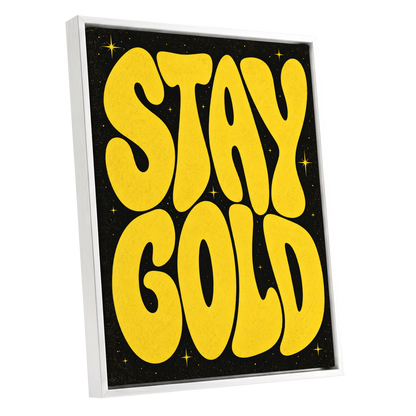 Stay Gold Starburst, yellow, black abstract wall art shown as a white framed canvas wall art
