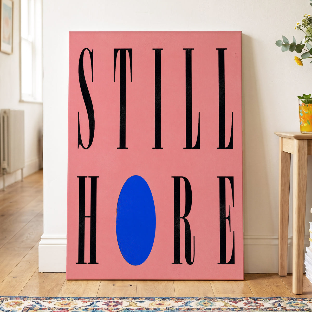Still Here in Blue, black, pink, blue minimalist wall art on canvas displayed in a styled interior, gallery view 2