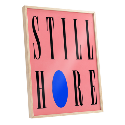 Still Here in Blue, black, pink, blue minimalist wall art shown as a oak framed poster wall art print