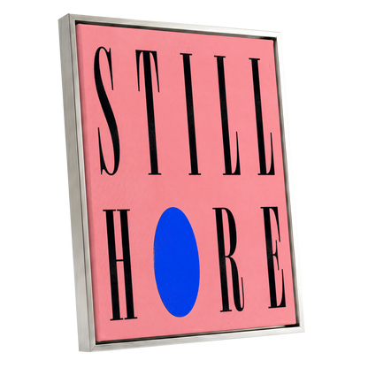 Still Here in Blue, black, pink, blue minimalist wall art shown as a silver framed canvas wall art
