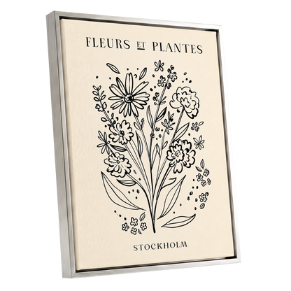 Stockholm in Bloom, black, beige, white floral wall art shown as a silver framed canvas wall art